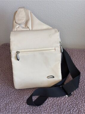 Travelon Cream Crossbody Sling with Black Strap